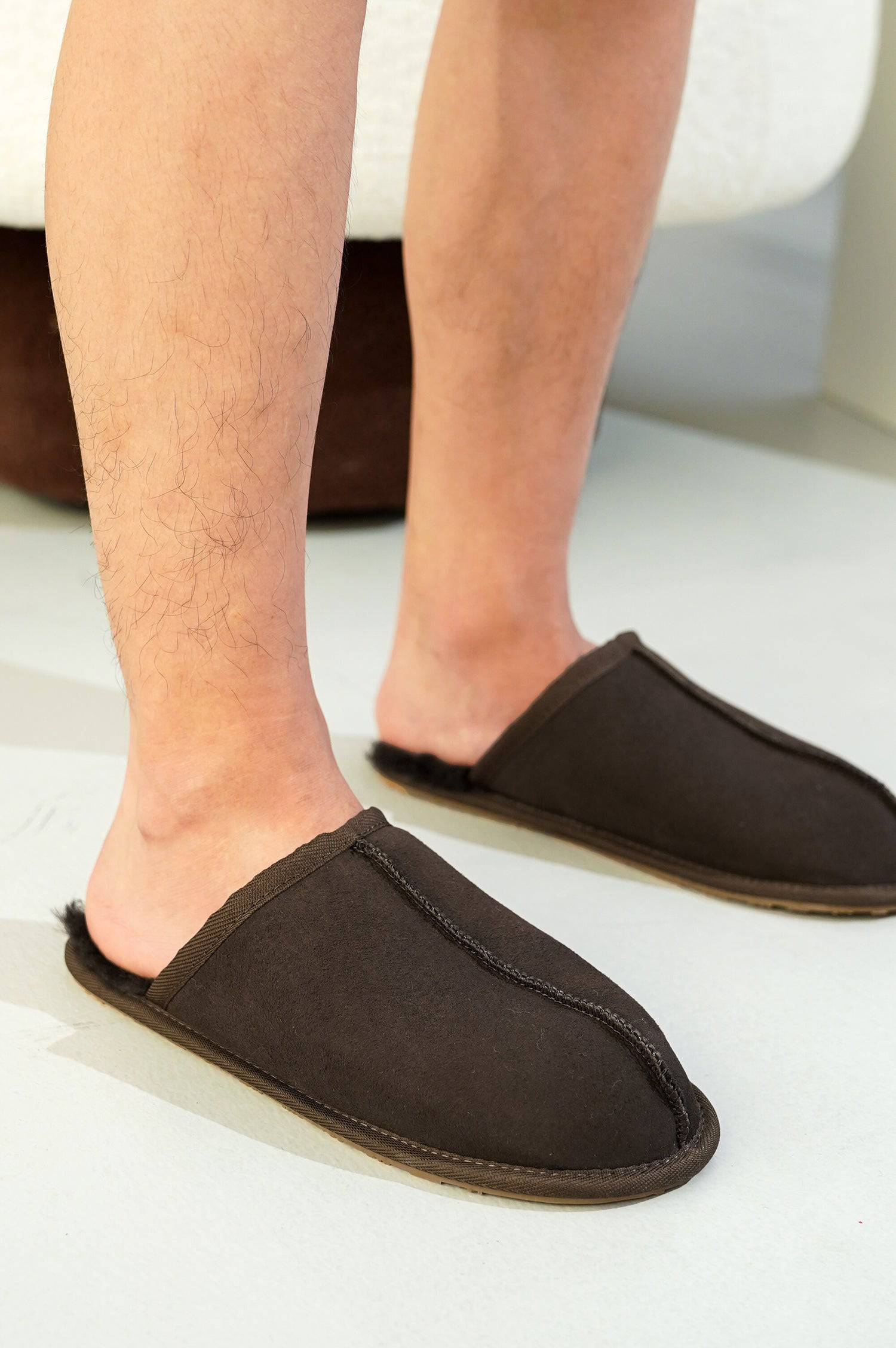 Project Cloud Colin Men's Slippers: Brown suede upper with sheepskin lining, demonstrating cozy comfort and style.
