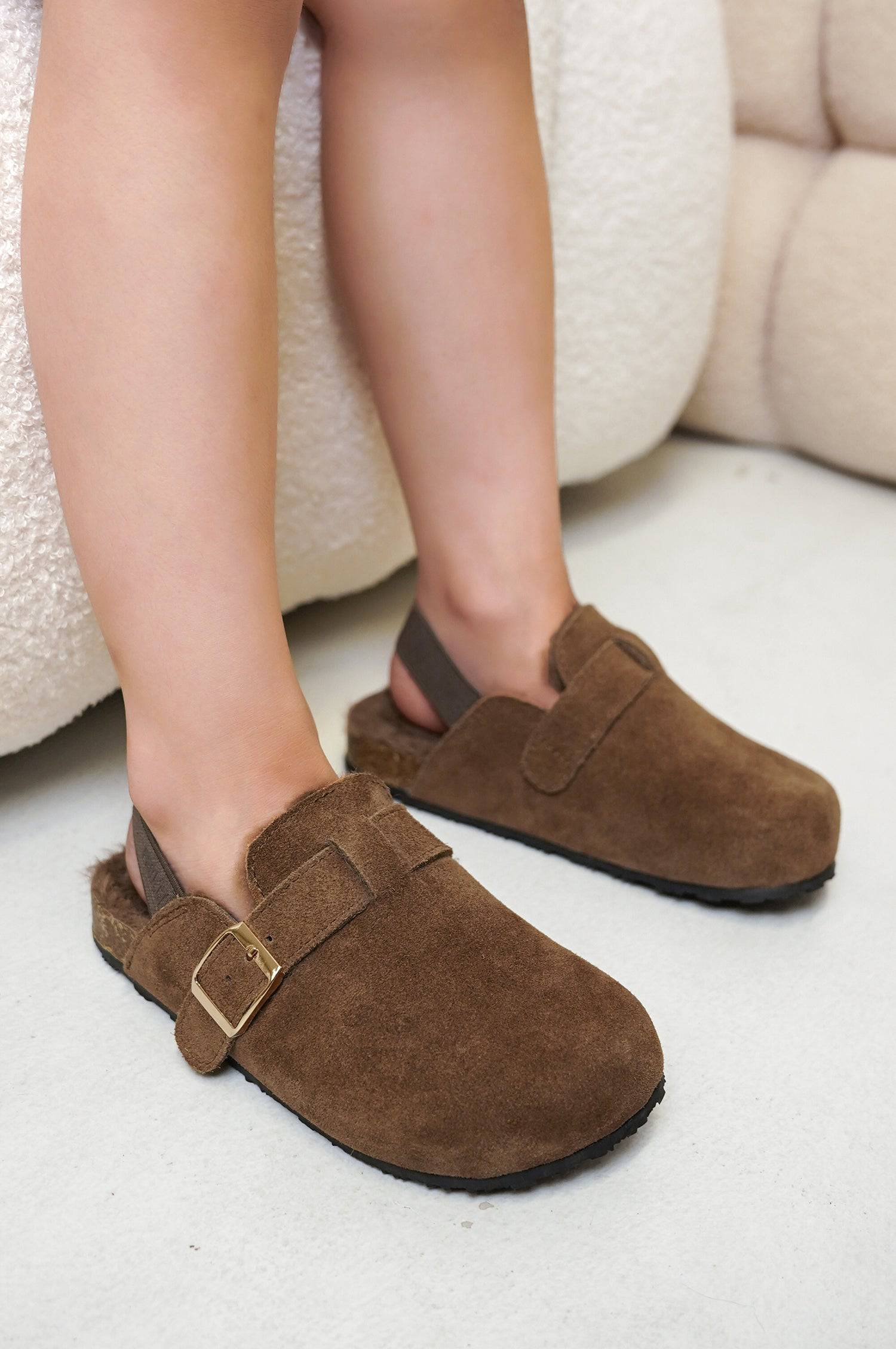 Project Cloud Kids' Brown Suede Clogs with Buckle, Back Strap, and Fluffy Lining. Stylish & Comfy.