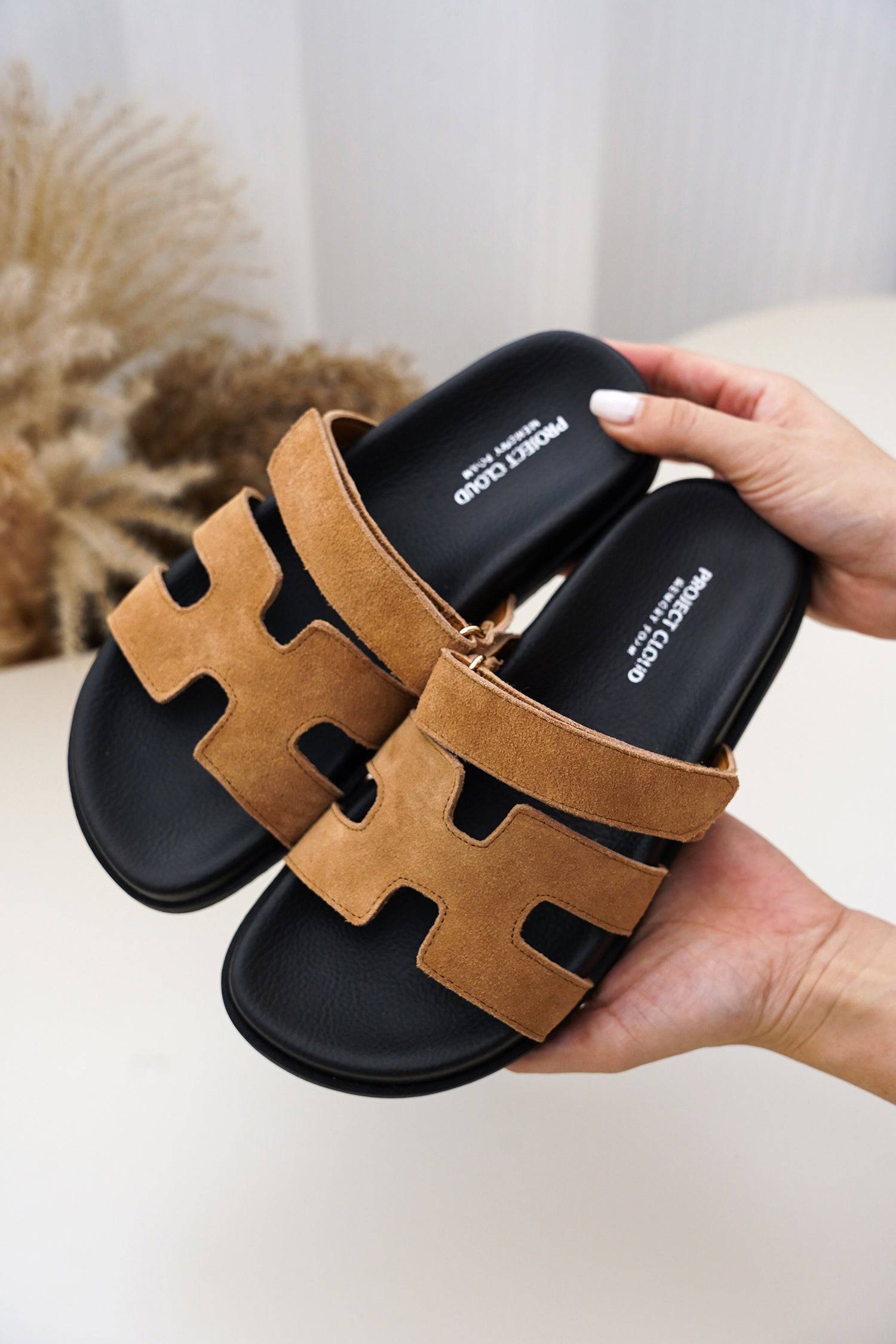 Project Cloud Mayven women's platform sandals with brown suede straps and black sole. Memory foam slip-on sandals.