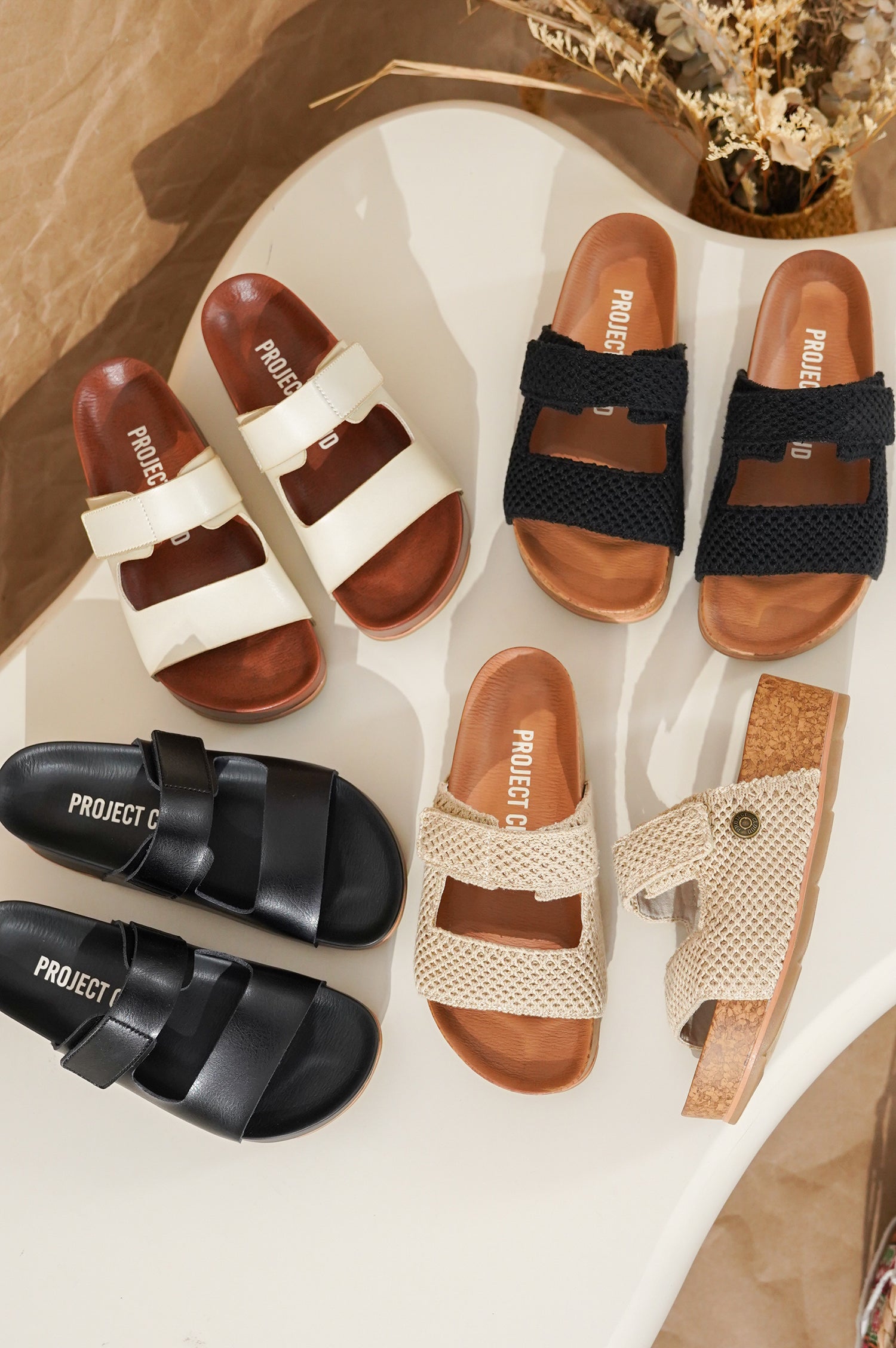 Project Cloud Prime sandals in beige, black leather, and knitted designs. Cork platform, memory foam