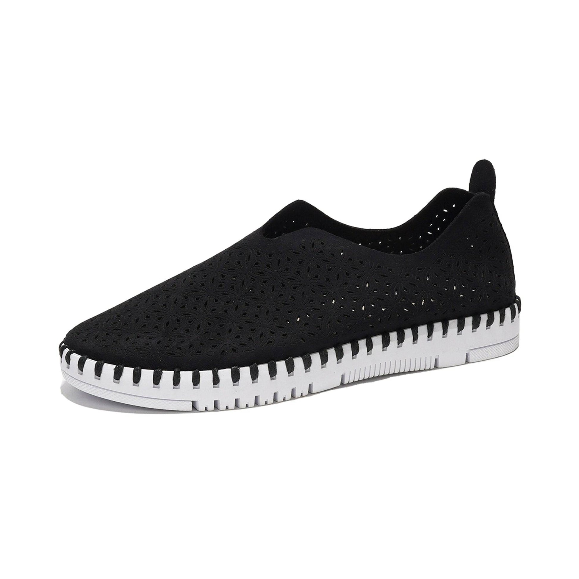 Black floral cut-out slip-on sneakers for women, white sole. Lightweight and breathable.