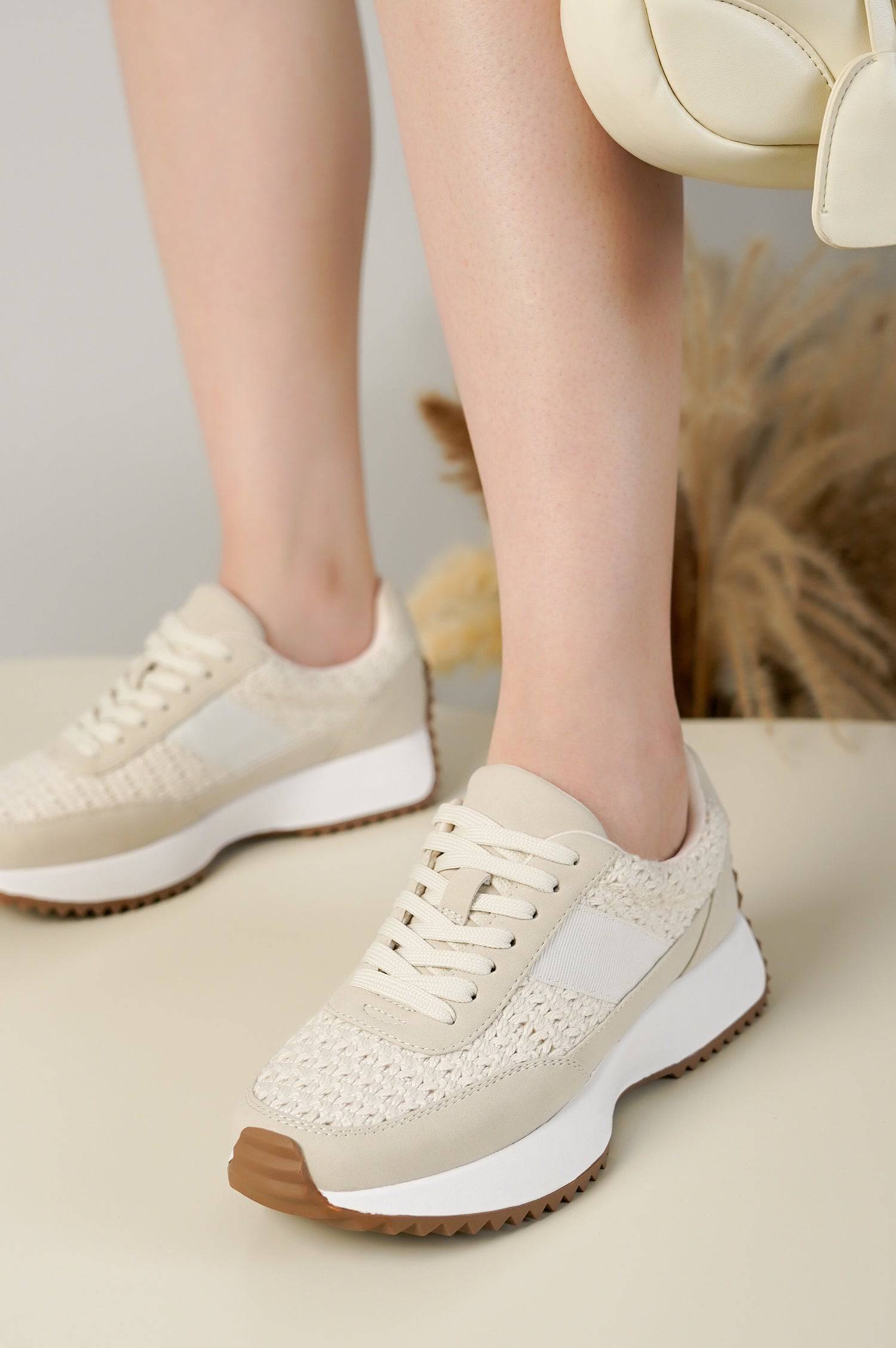 Project Cloud Serena women's sneakers in beige, knitted upper, lace-up design, white midsole, and brown outsole.