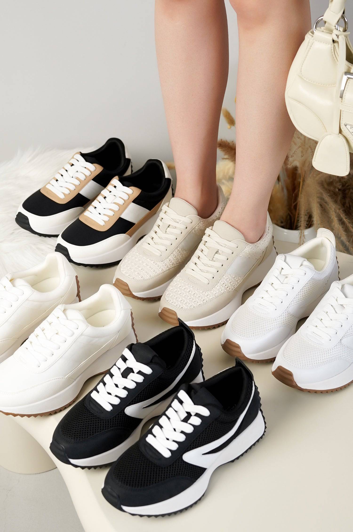 Project Cloud women's sneakers in various colors, lace-up design, showcasing comfort and style.