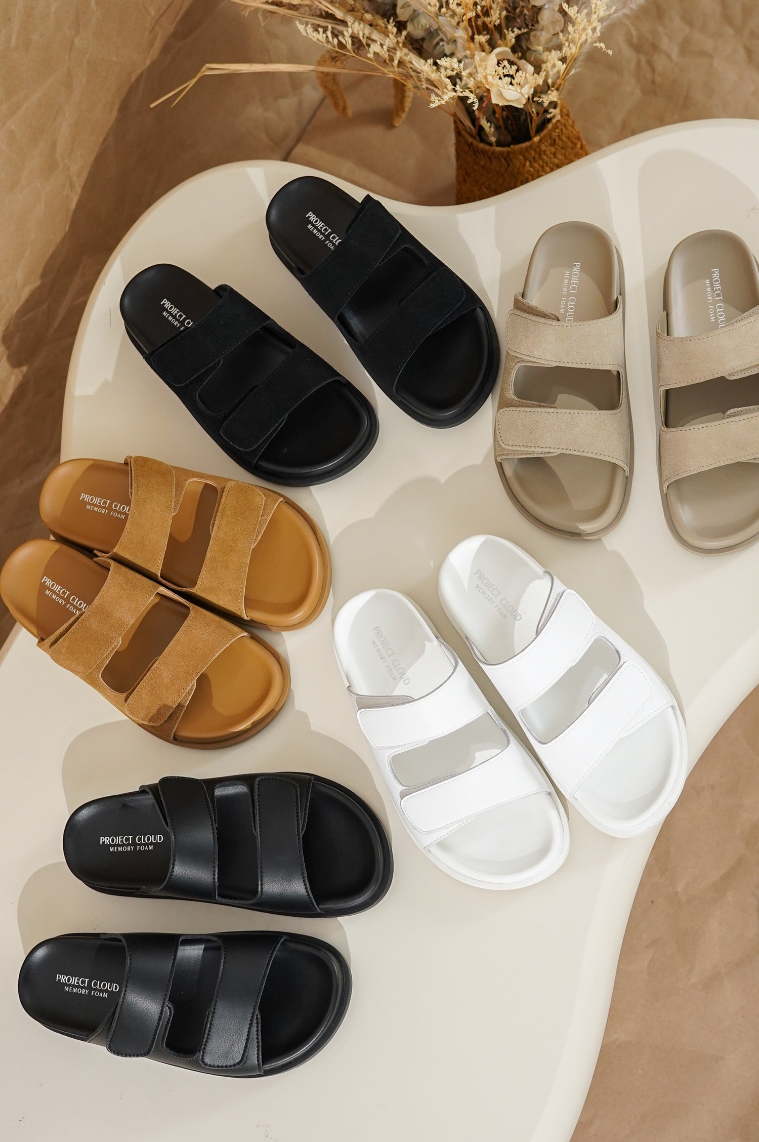 Project Cloud Sleek Platform Sandals in multiple colors: black, beige, white, and brown suede. Featuring memory foam comfort.