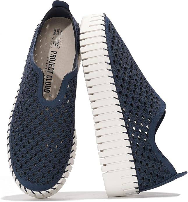 Project Cloud Daffodil leather loafers in navy with white sole, perforated slip-on work shoes for women
