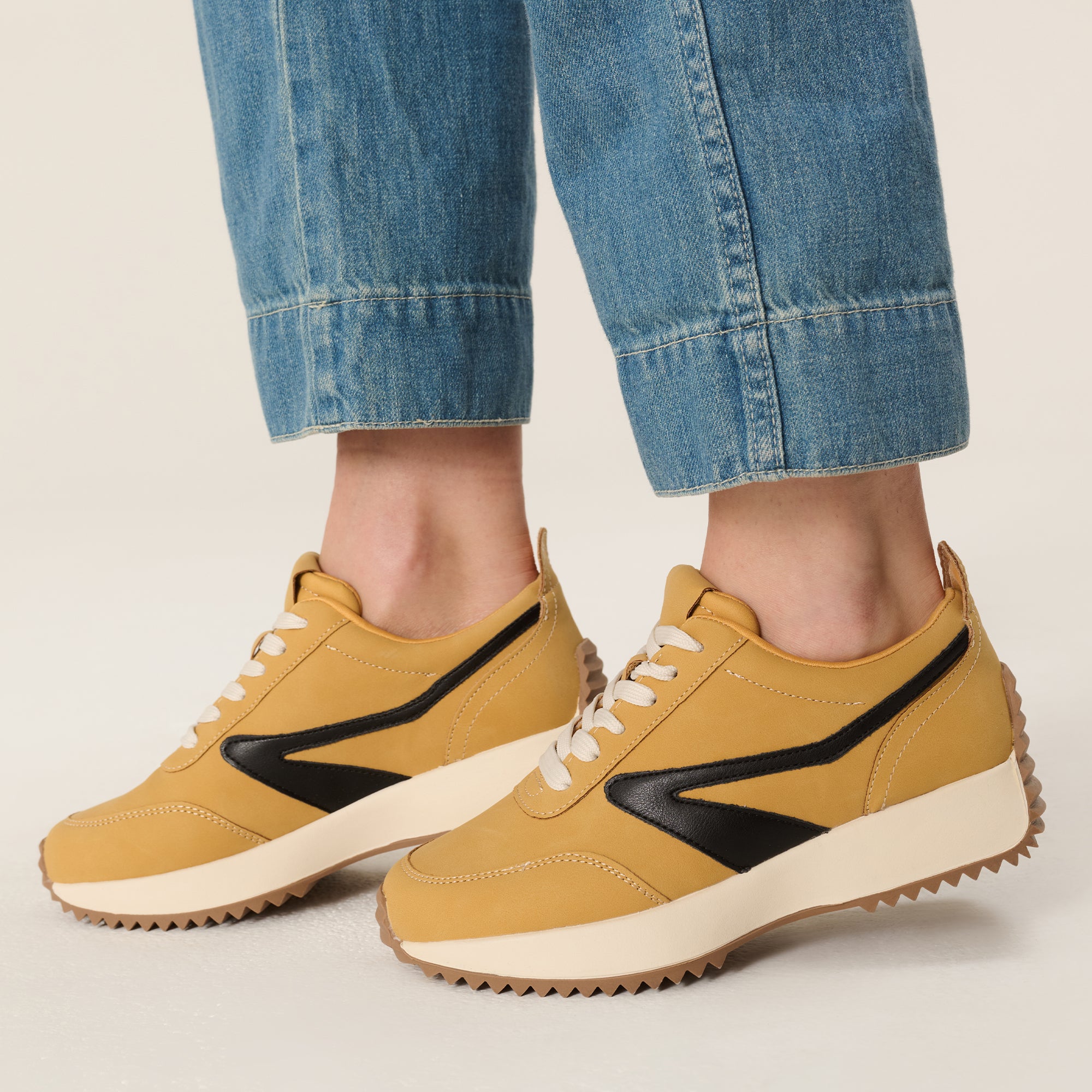 Balinda women's mustard yellow sneakers with Project Cloud logo, black accents, lace-up closure, and non-slip sole.