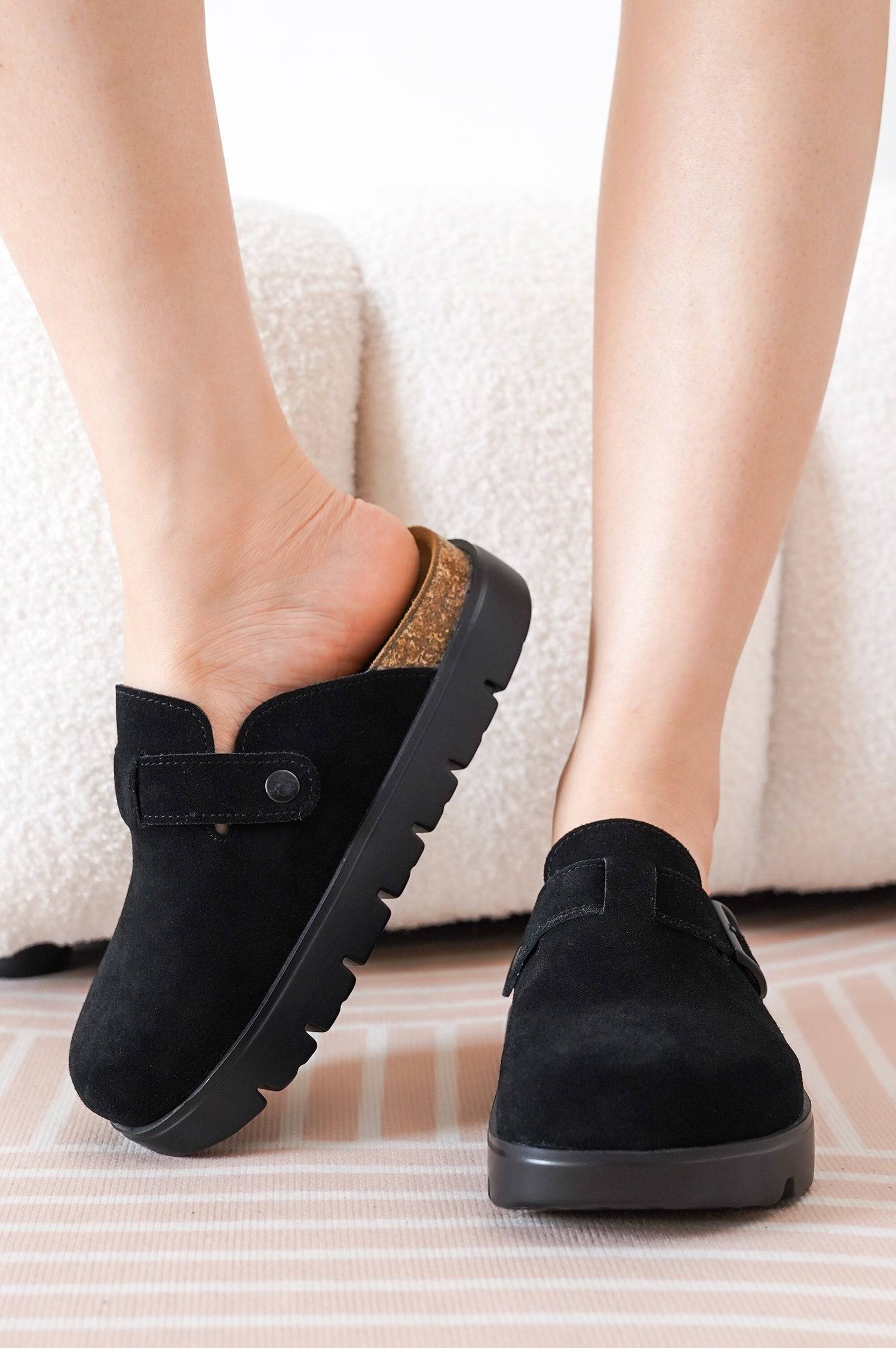 Black Benton Chunky Clogs for Women. Genuine suede clogs with cork footbed and platform sole for arch support.
