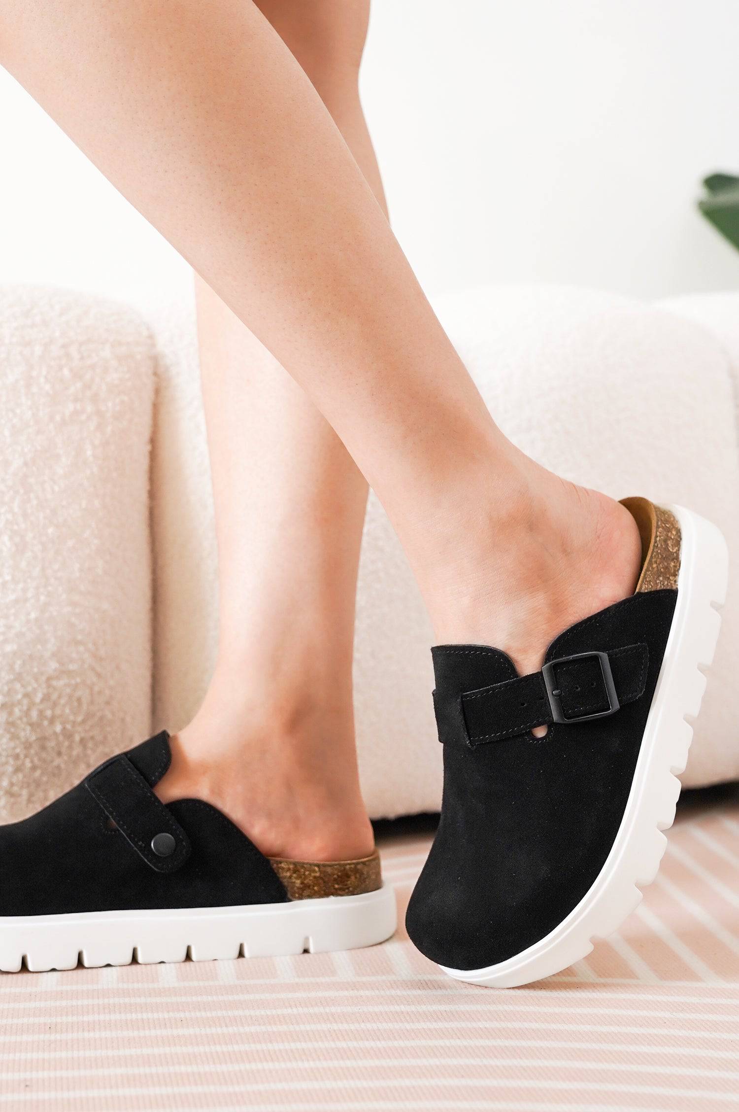 Black Benton Chunky Clogs for Women, featuring genuine leather upper, cork footbed, and white platform sole.