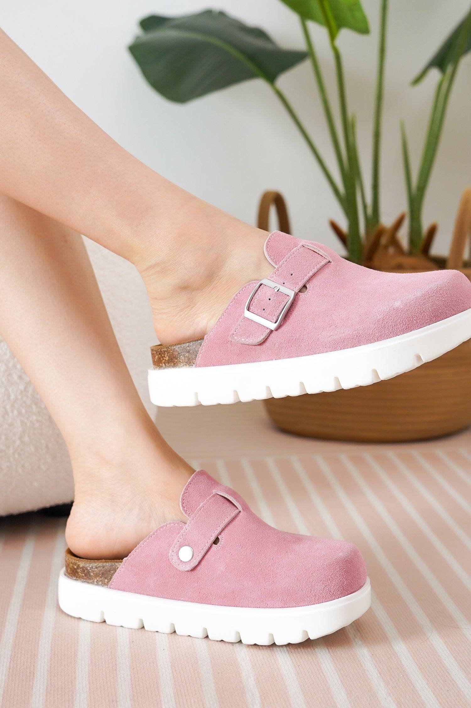 Mauve Benton Chunky Clogs for women. Genuine suede upper, cork footbed, and white platform sole for comfort and style.