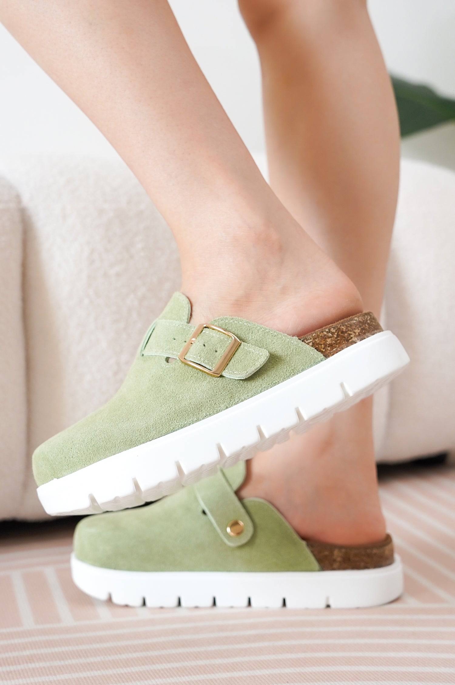 Green Benton Chunky Clogs for Women: Genuine suede upper, cork footbed, and platform sole for comfort and style.