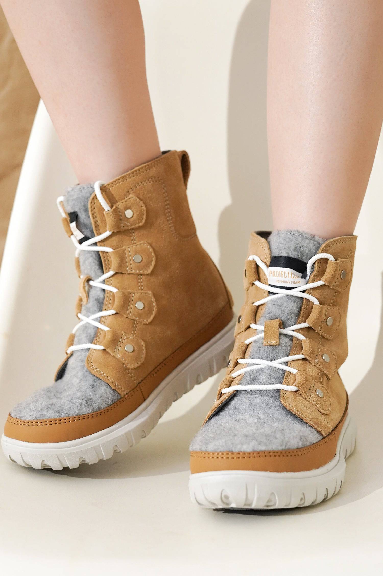 Project Cloud Leonora snow boots in tan suede with gray felt panel, white laces, and memory foam.