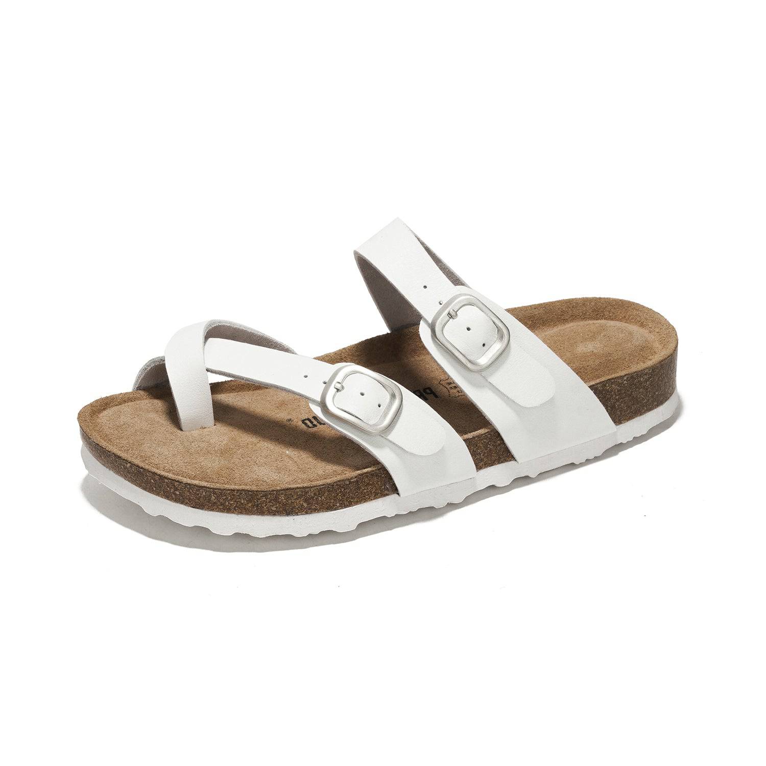 White leather sandals with cork footbed and buckle details, perfect summer footwear.