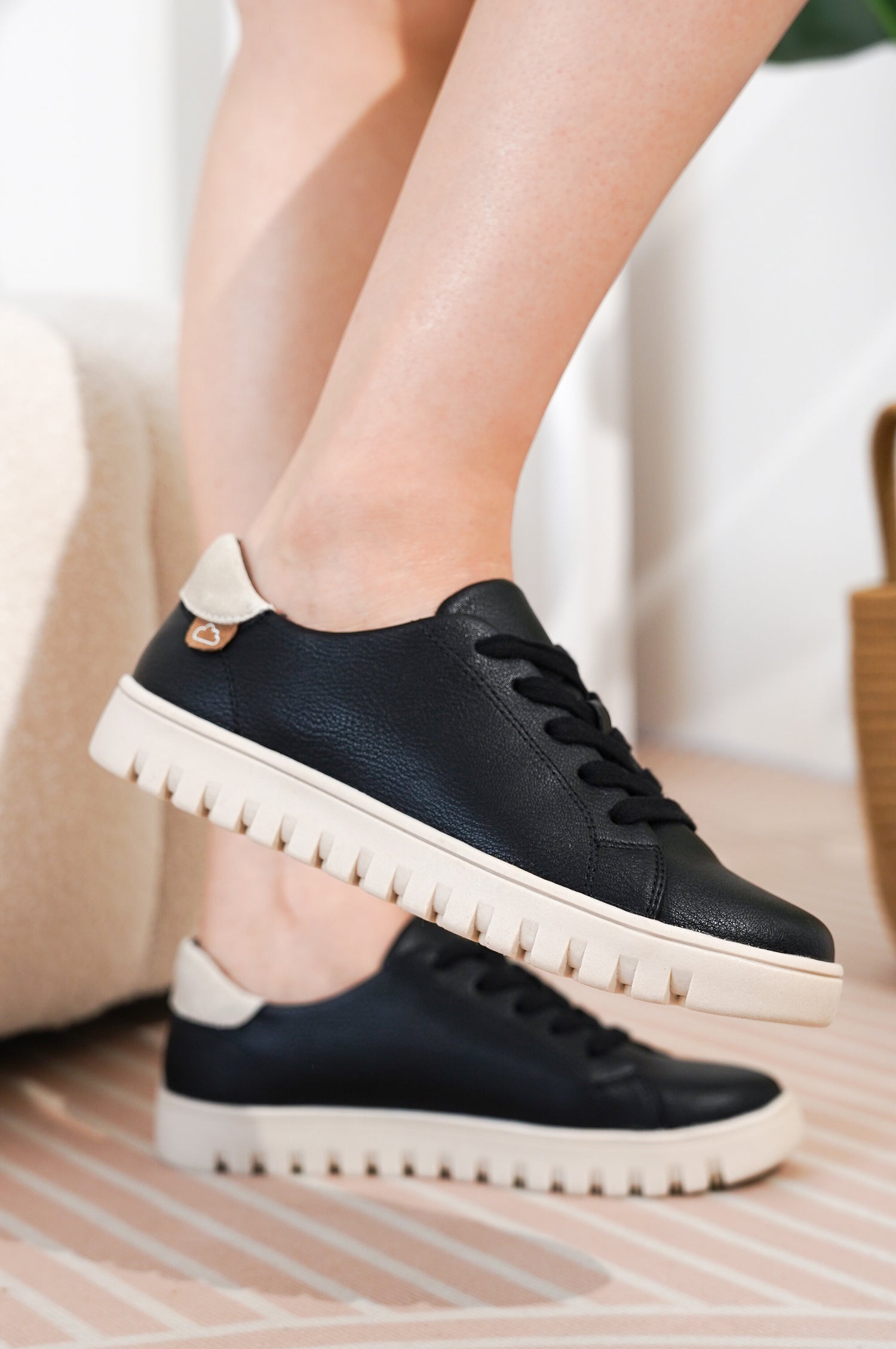 Project Cloud Black Vegan Leather Sneakers on feet. Platform sneakers with non-slip sole, featuring the brand logo.