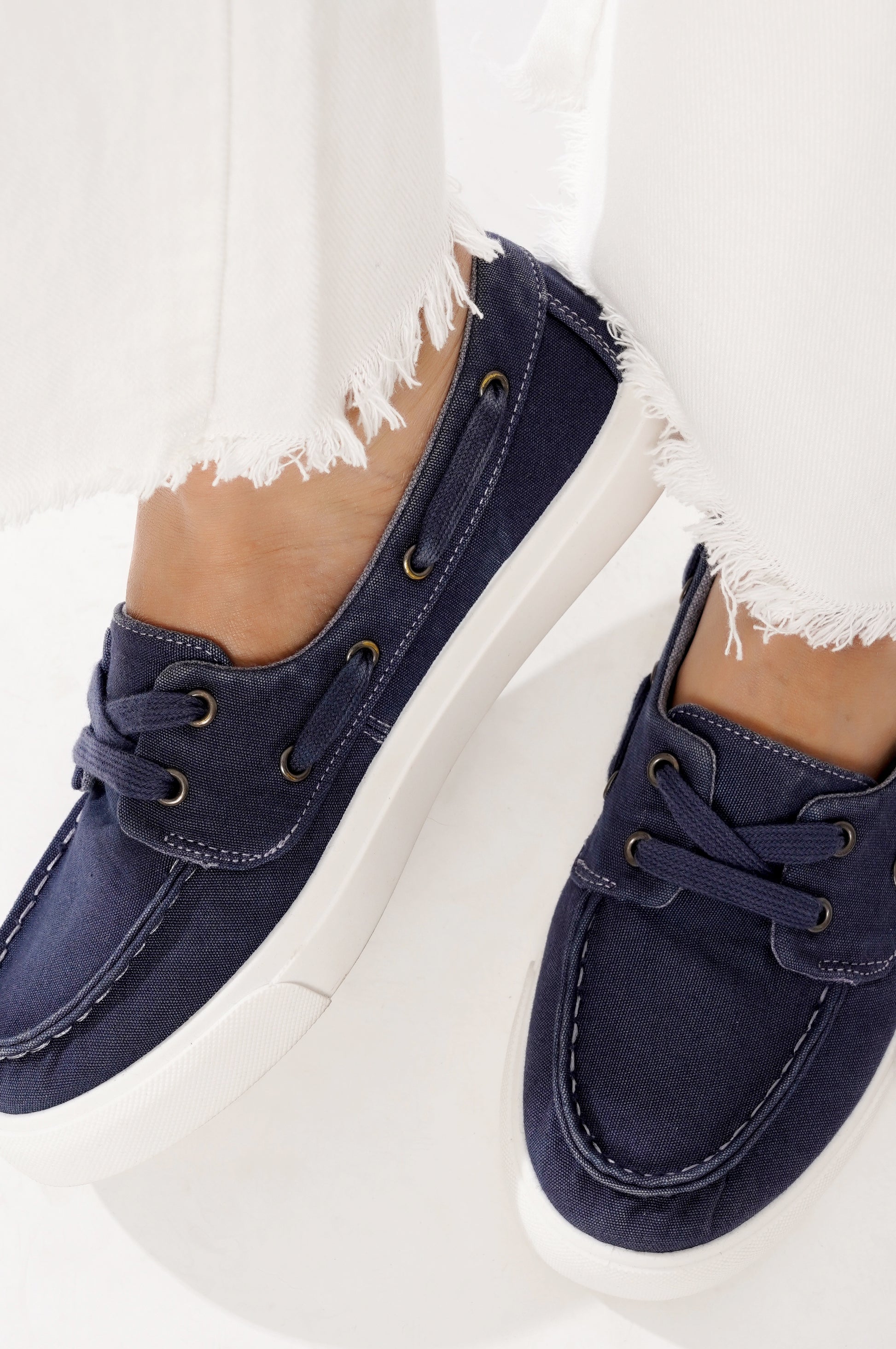 Project Cloud "Seasalt" women's navy canvas boat shoes with white sole. Comfortable and stylish sneakers.