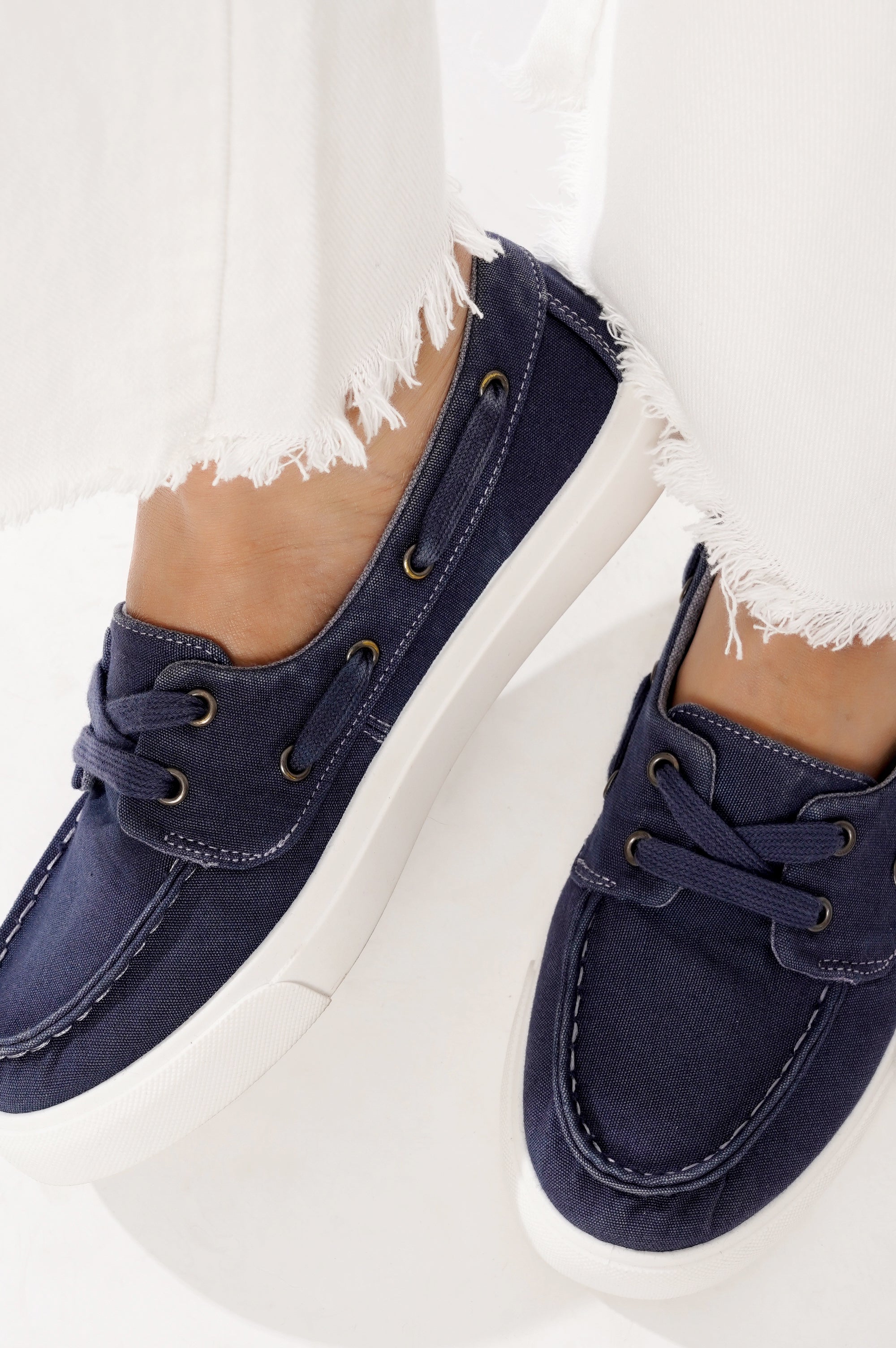 Project Cloud "Seasalt" women's navy canvas boat shoes with white sole. Comfortable and stylish sneakers.
