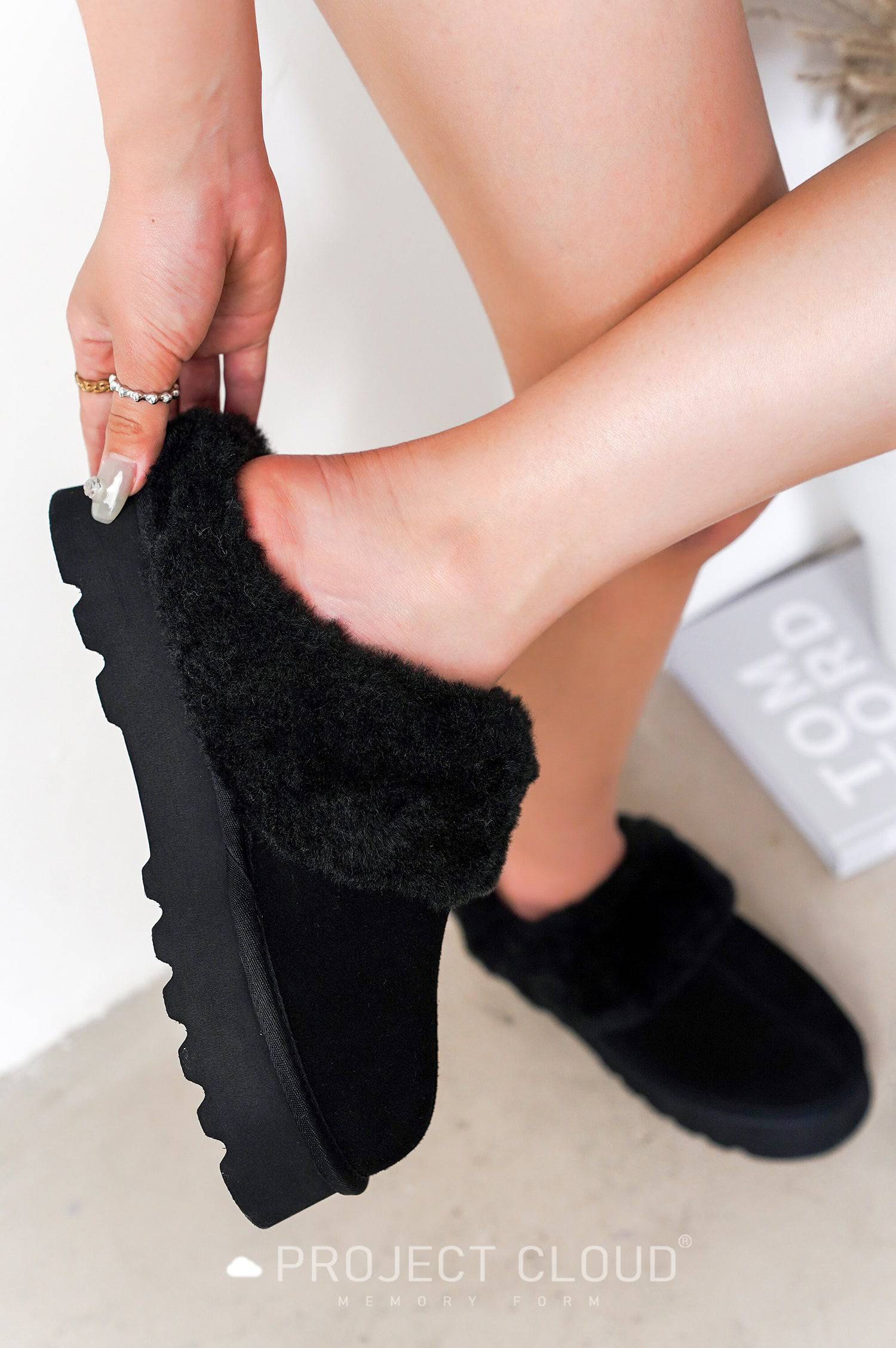 Project Cloud black suede platform slipper with fluffy fur lining and memory foam.