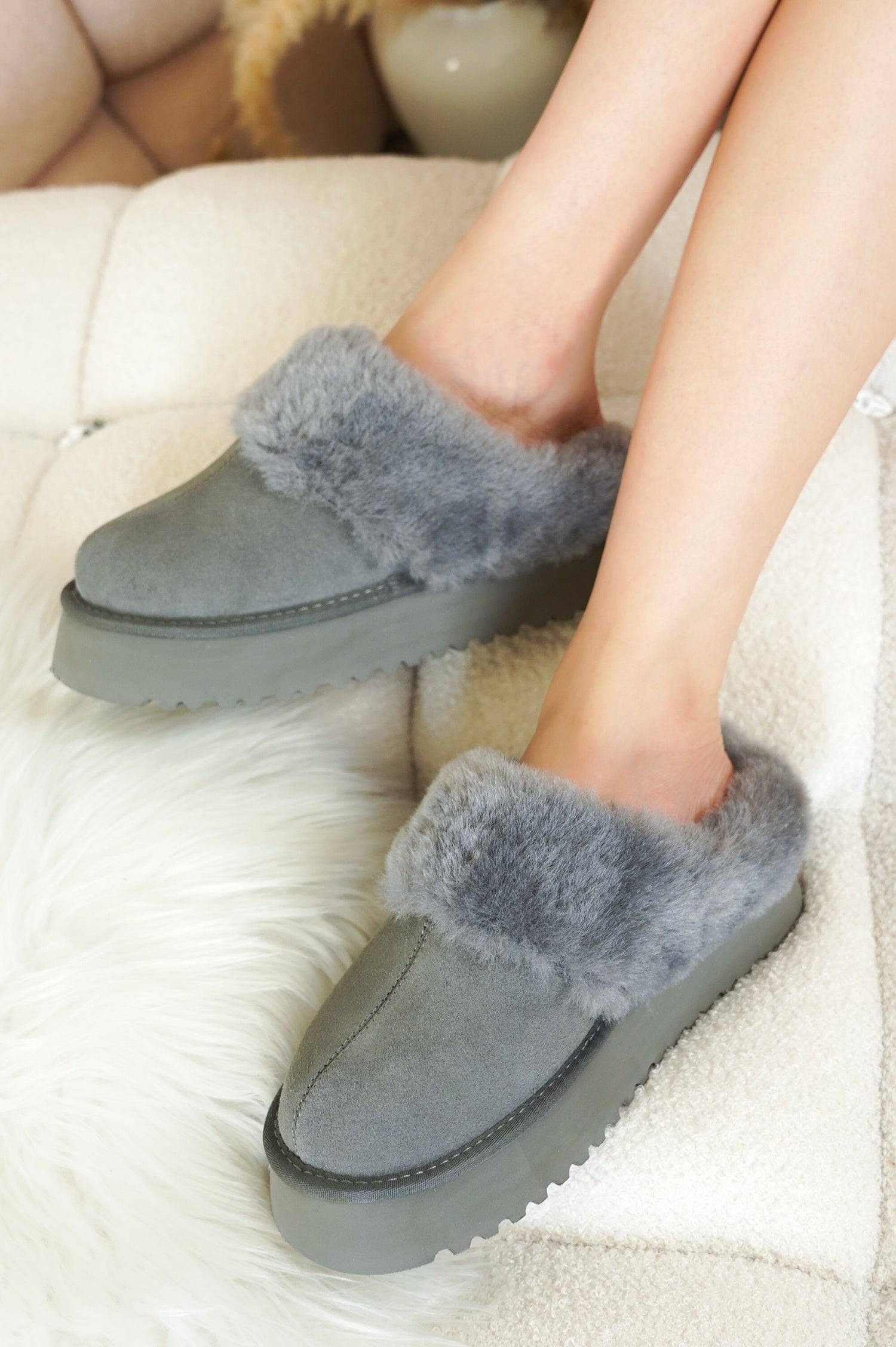 Project Cloud Snowy Platform Slippers in gray suede with fluffy fur lining and memory foam insole.
