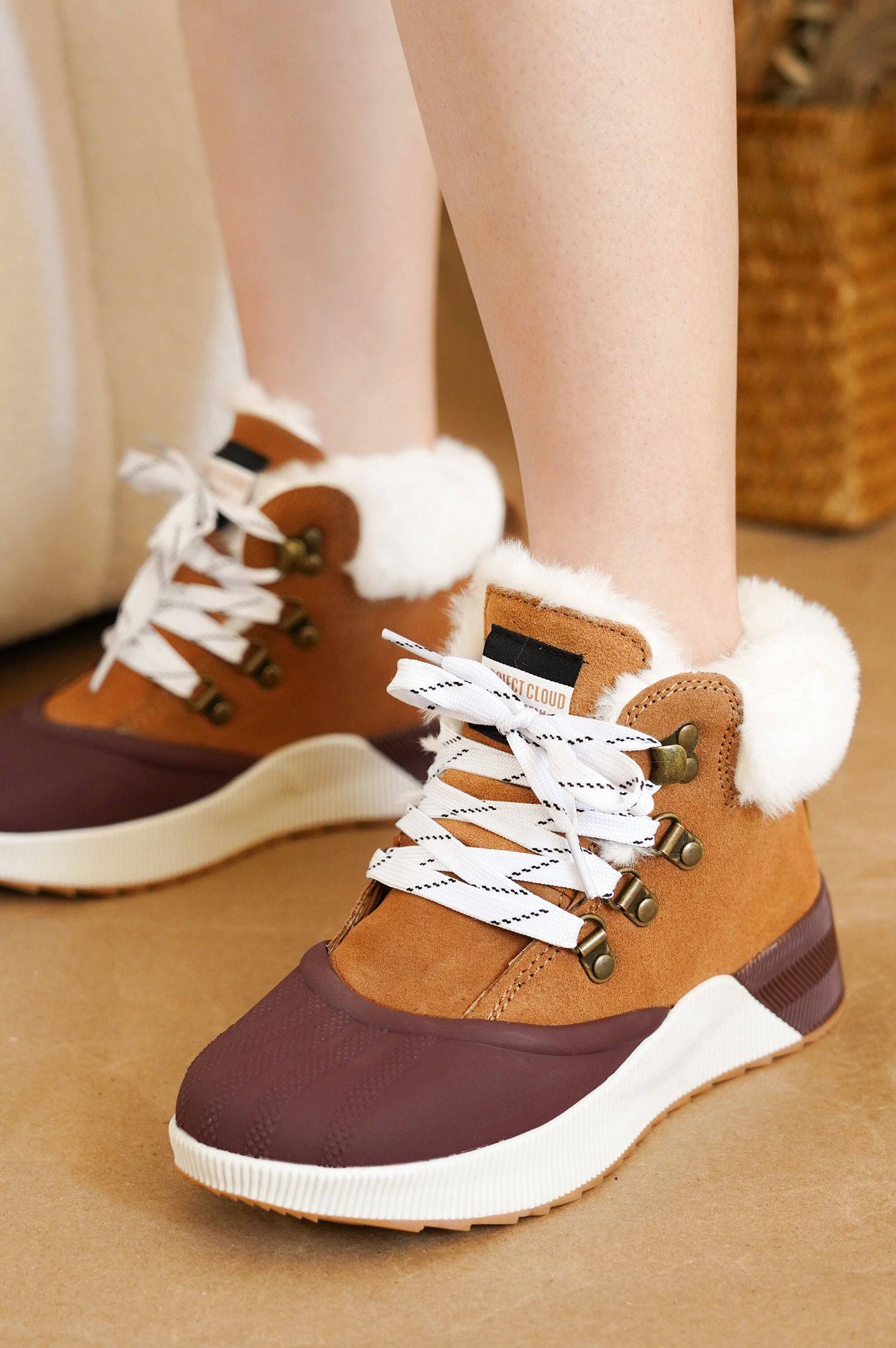 Project Cloud Terina Boots: Women's waterproof, insulated boots in brown suede, white laces, and faux fur trim.