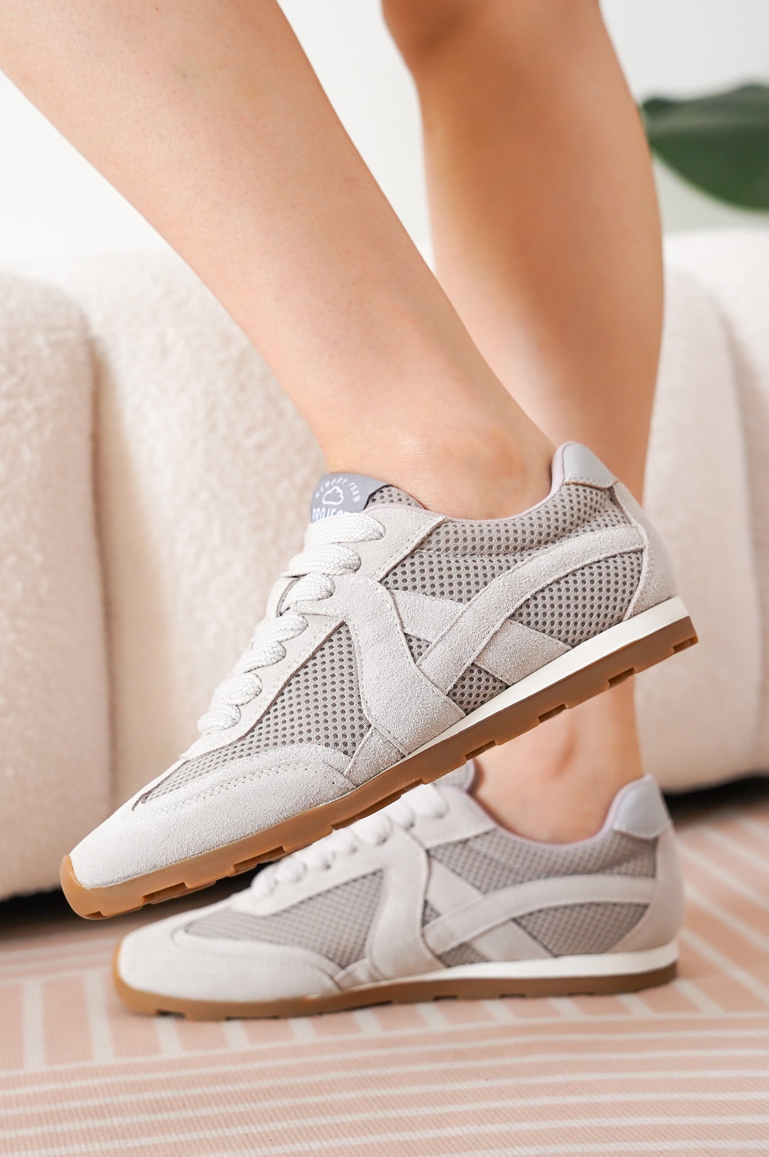 Project Cloud "Tiger" taupe sneakers featuring suede, mesh, and memory foam, shown on foot for style.
