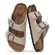 Project Cloud Venita Leather Sandals in Beige. Adjustable buckle straps, cork footbed, and durable sole. Memory foam comfort.